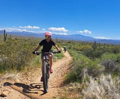 Mountain biking through a valley of the Hindu Kush