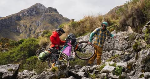 Mountain bikers on a dirt track in Deosai National Park