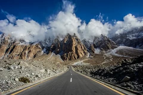 A cyclist riding along the Karakoram Highway